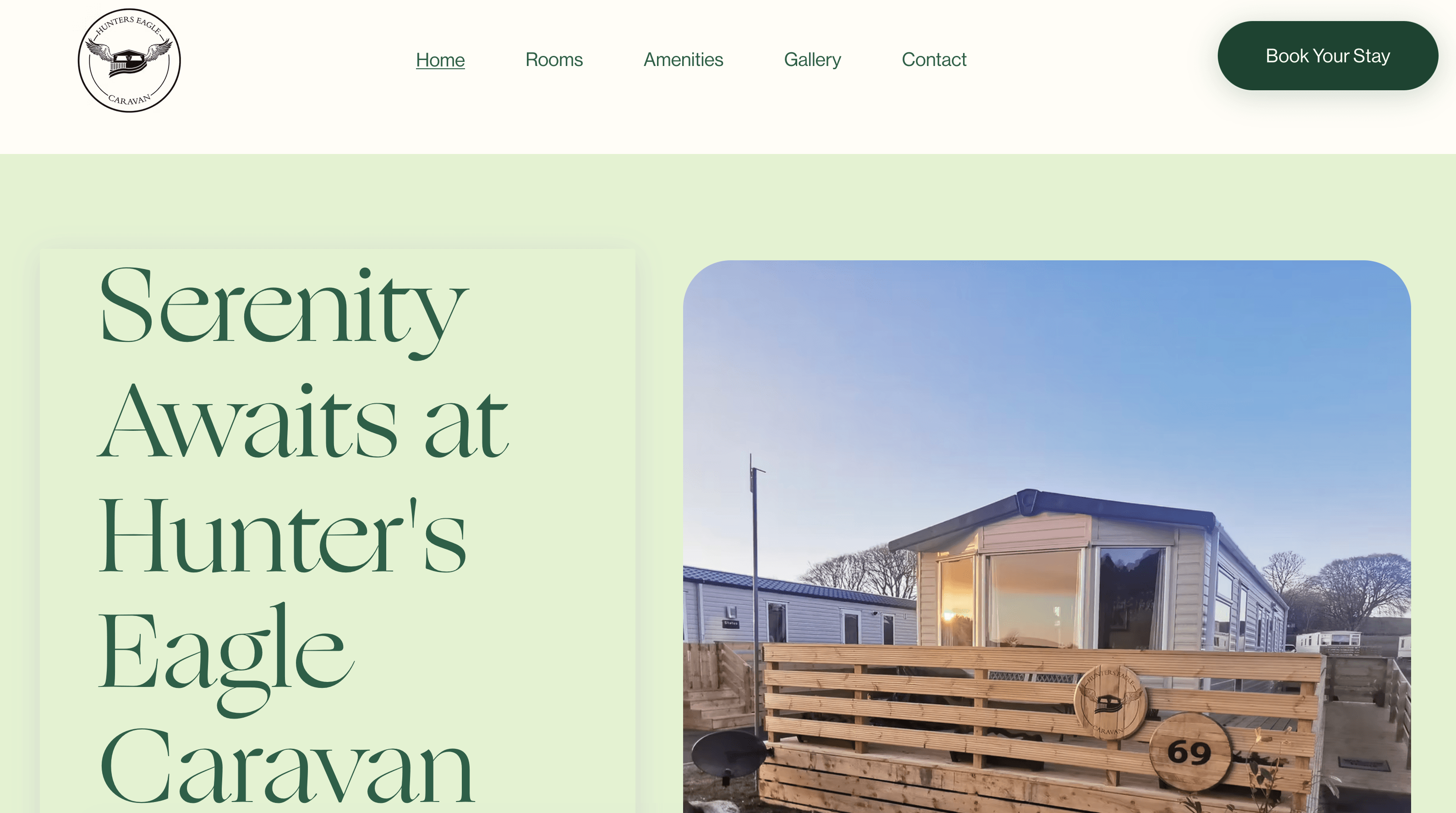 Hunter's Eagle Caravan website header featuring a modern static caravan with a wooden deck.